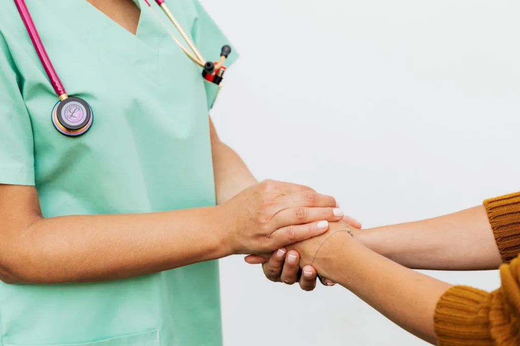 doctor comforting patient